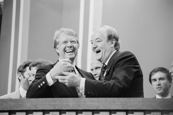 Jimmy Carter (L), a clean-shaven Gallagher (R)