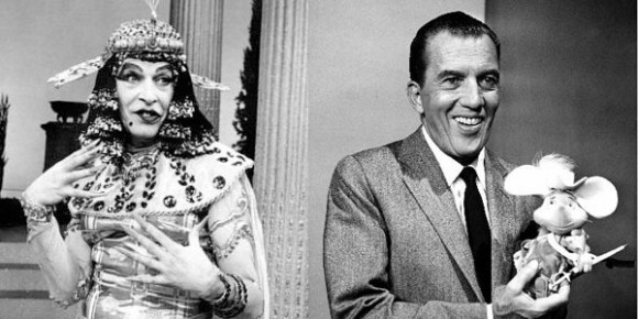 Milton Berle in drag (L), Imogene Coca in Ed Sullivan drag (R)